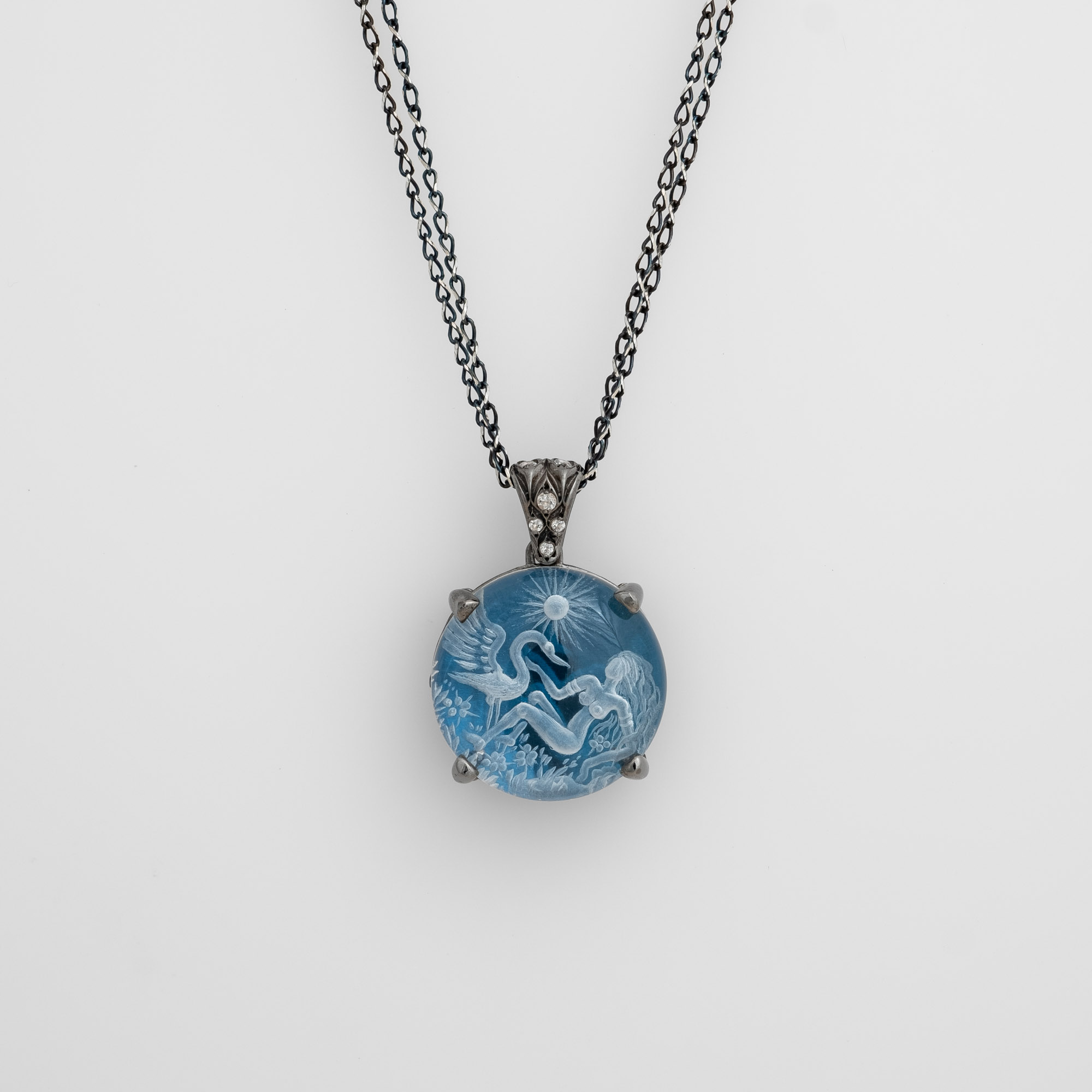 Necklace “Swan and Leda” with engraved quartz and white topaz