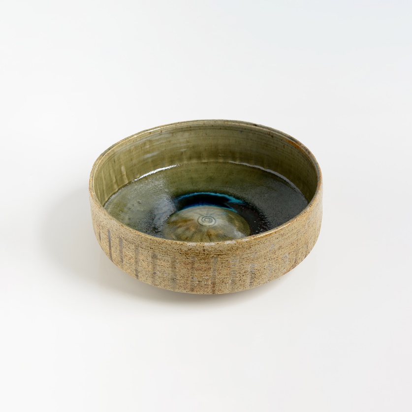 Beige ceramic bowl with unique glazing