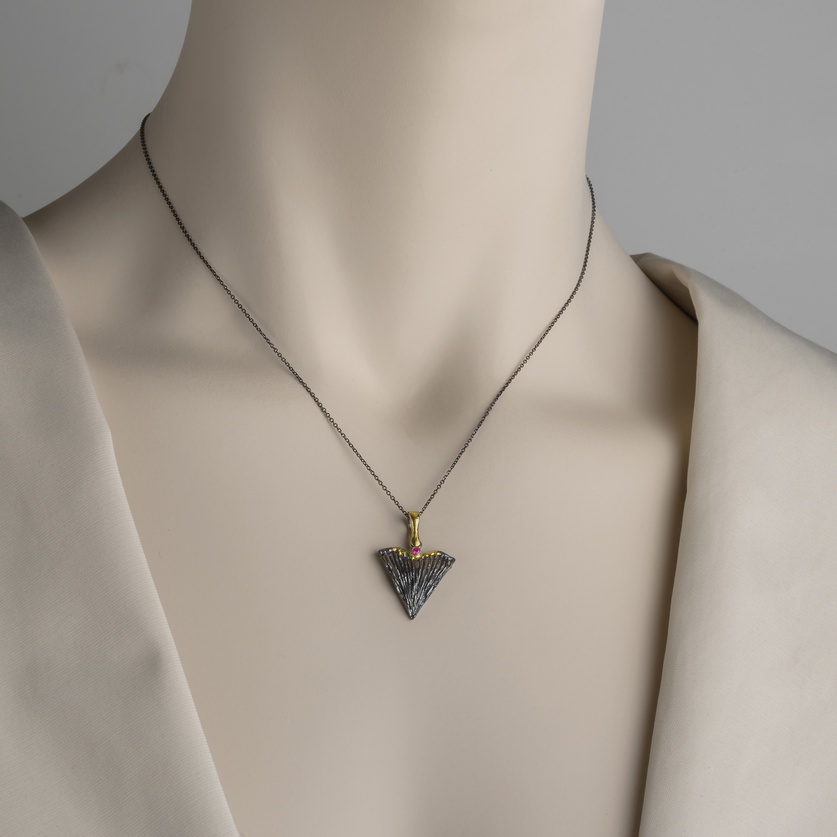 "Eagle" pendant in silver and gold inlay with small ruby