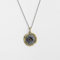 "Wheel" pendant in silver, gold inlay and ruby (medium size)
