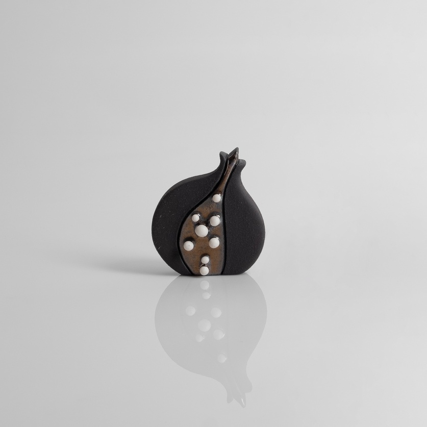 Flat black pomegranate with white beads (small size)