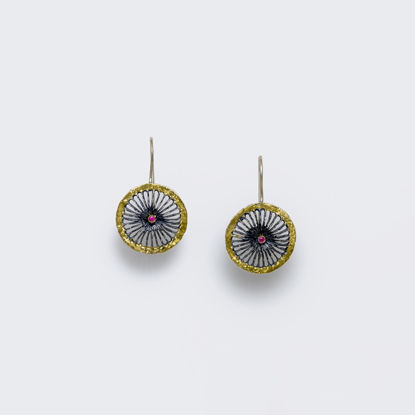 Elegant silver earrings with gold inlay and rubies