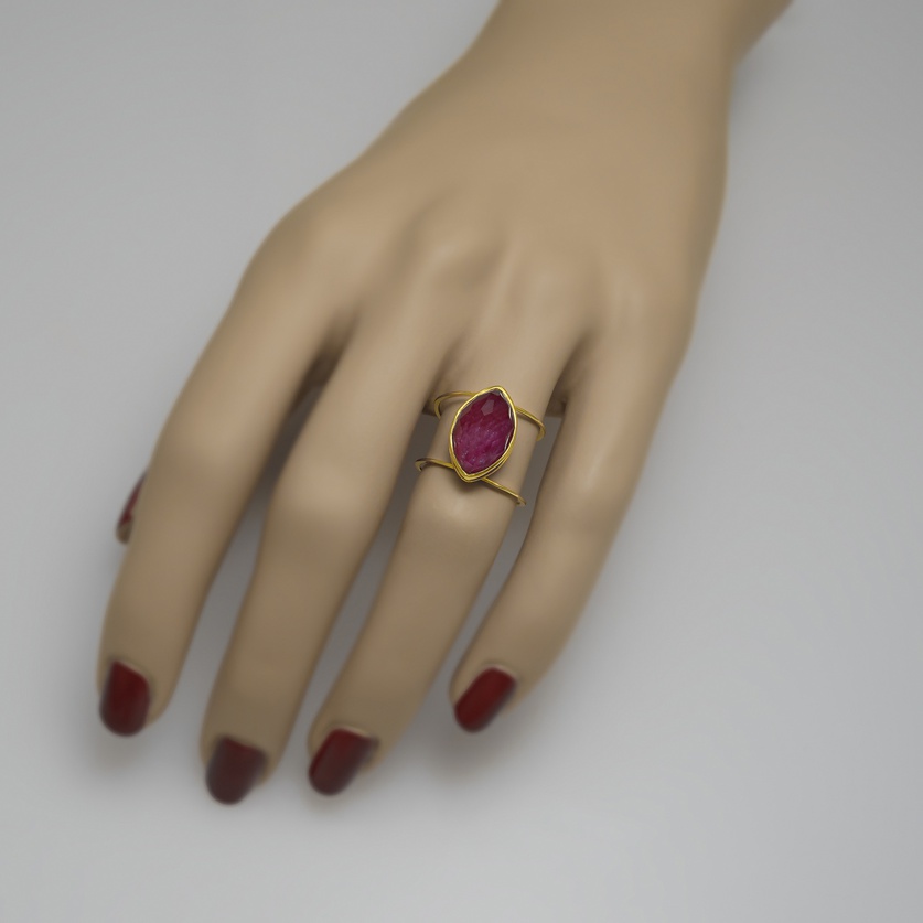 Gold with faceted ruby-quartz doublet stone