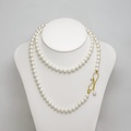 Impressive long necklace with gold and white pearls