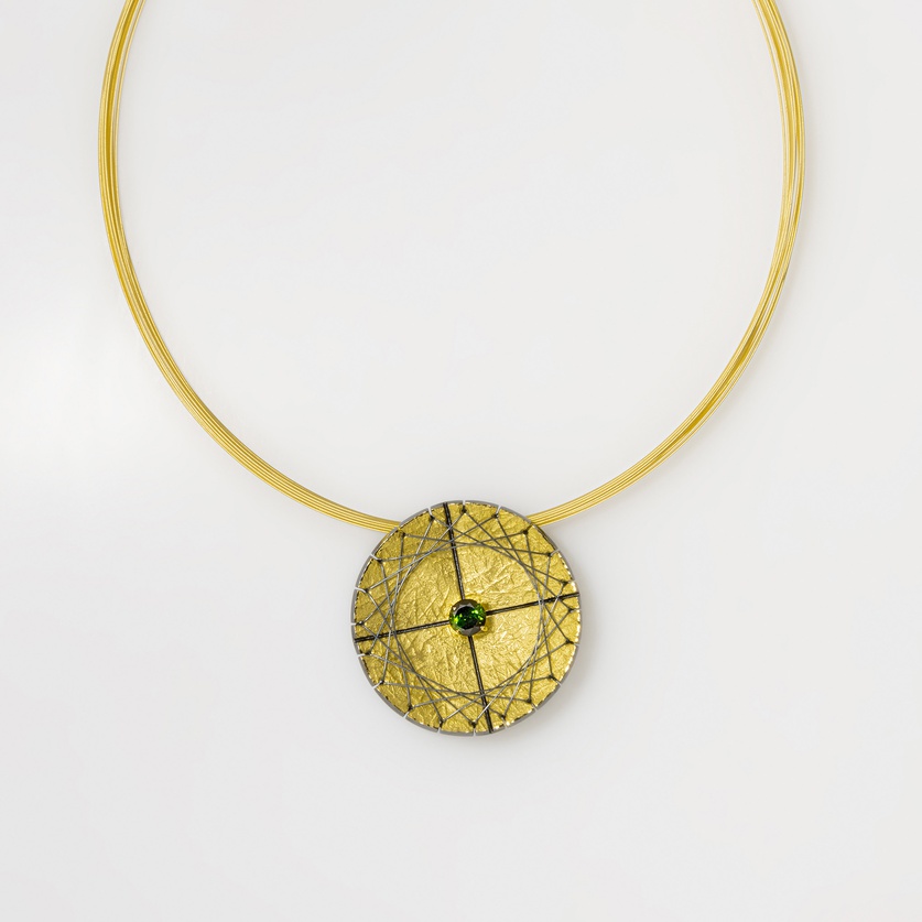 Striking silver & gold necklace with green tourmaline