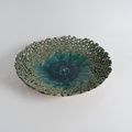 Dark green platter with perforated design