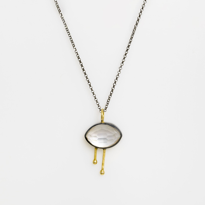 Modern silver pendant with gold and mother-of-pearl