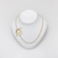 Necklace of sophisticated design in gold and pearls