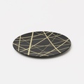 Decorative ceramic platter with asymmetrical lines