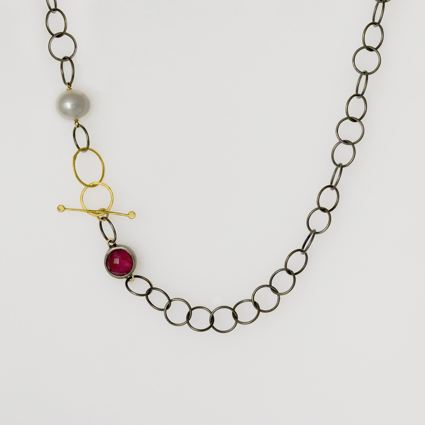 Black silver & gold necklace with ruby doublet stone and pearl