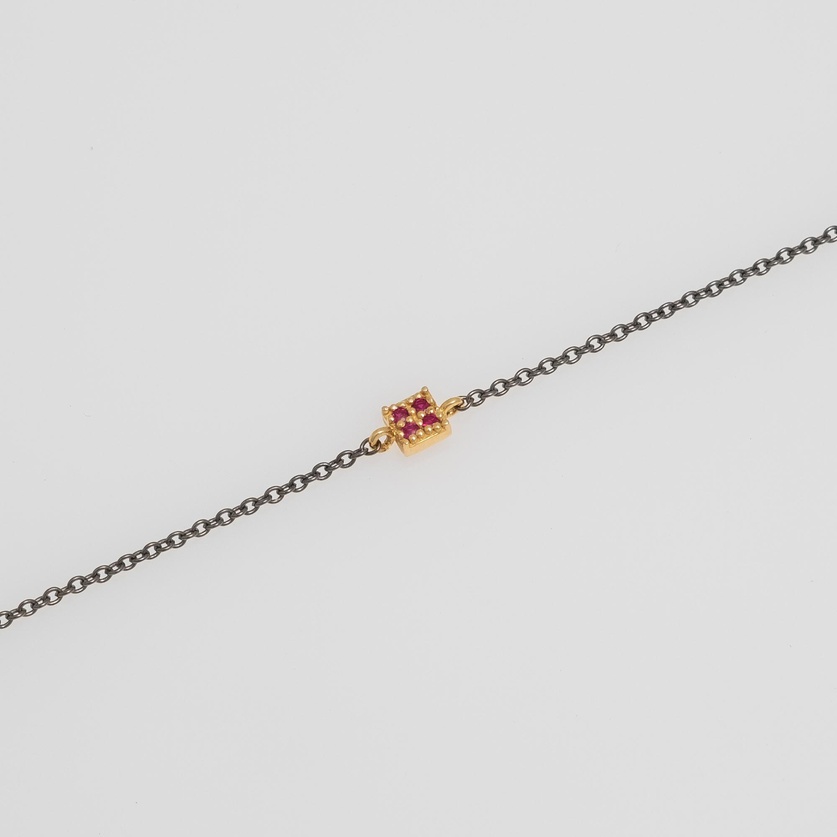 Bracelet in silver and gold with rubies