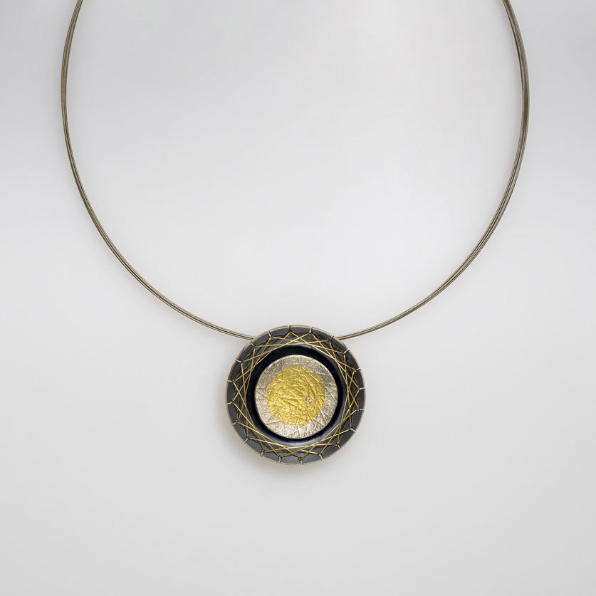 Beautiful silver & gold necklace with small diamond