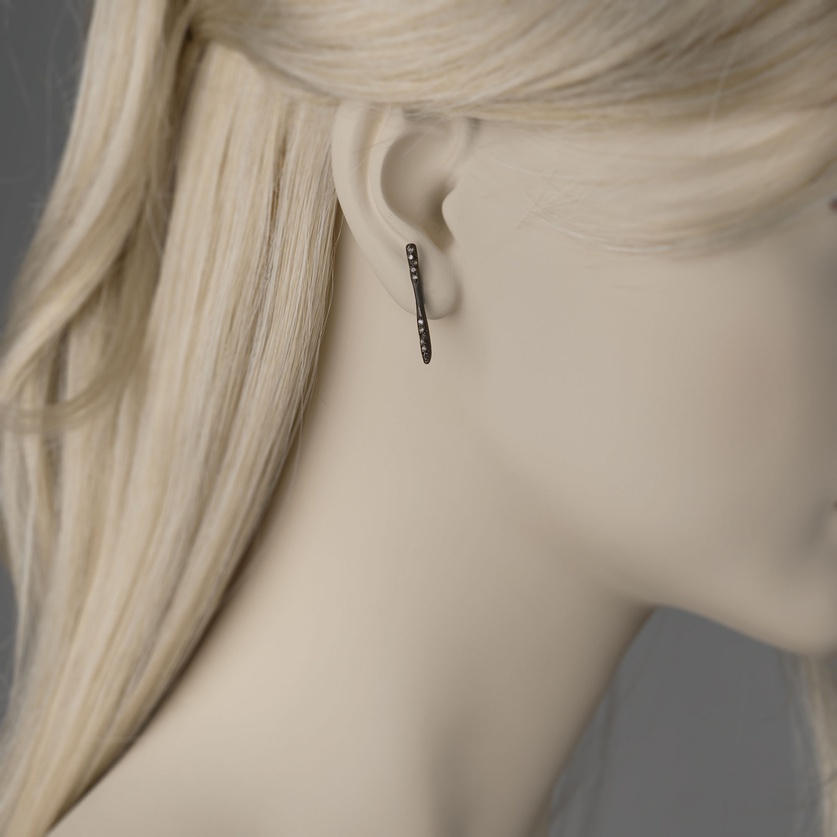 Modern silver earrings with rosecut diamonds