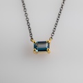 Beautiful necklace in gold with blue topaz