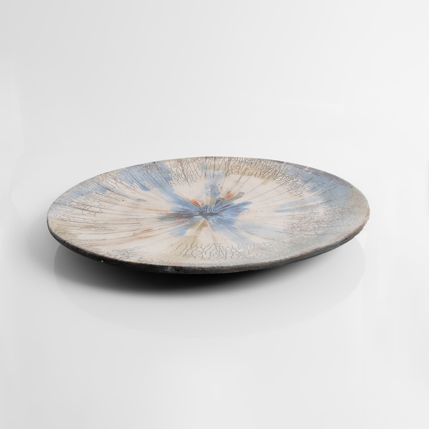 Round platter with blue and greenish colors