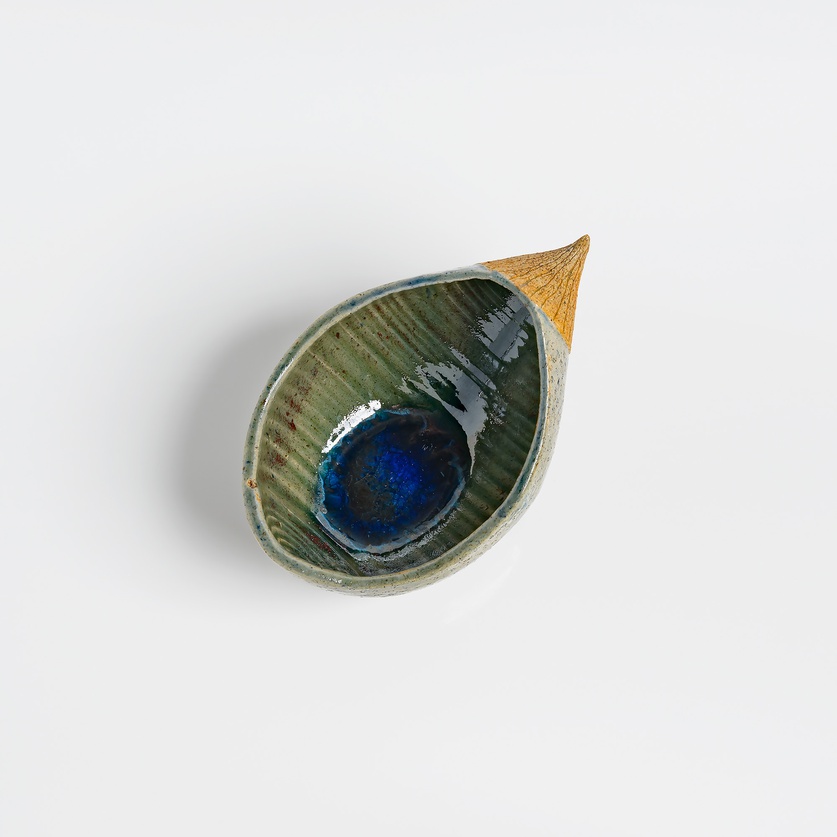 Small ceramic "canoe-shaped" bowl