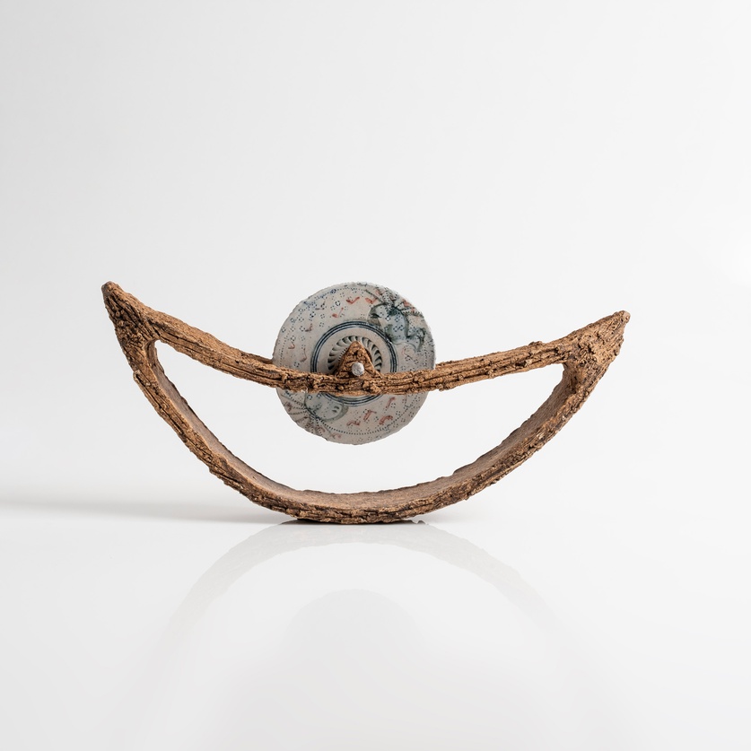 Ceramic boat with disc