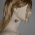 Flower-shaped drop earrings in black silver & pearls