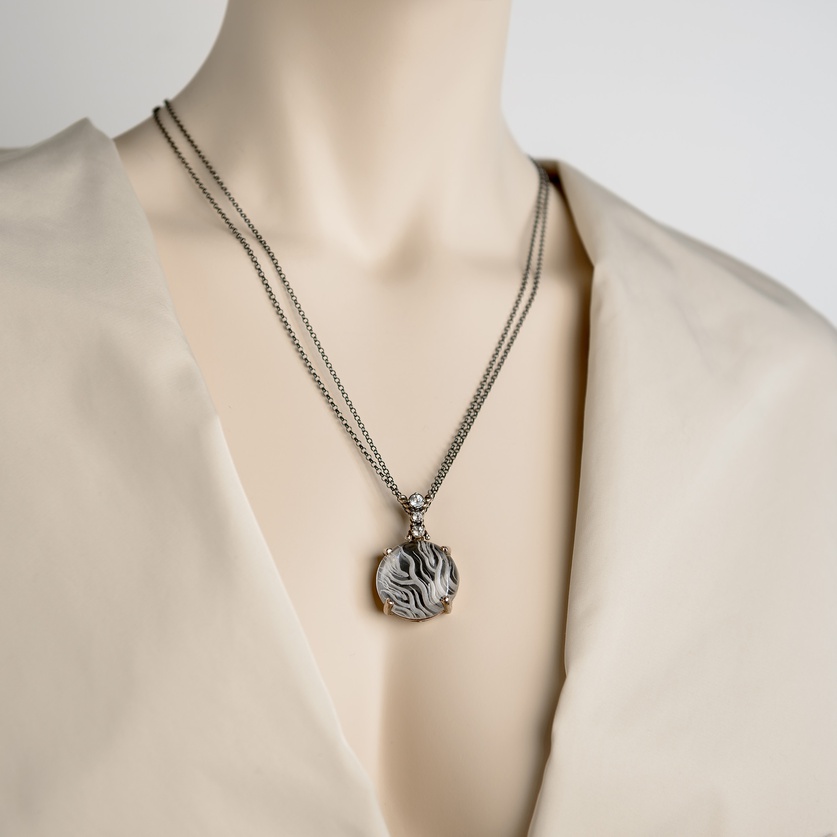 Fine quartz necklace with topaz