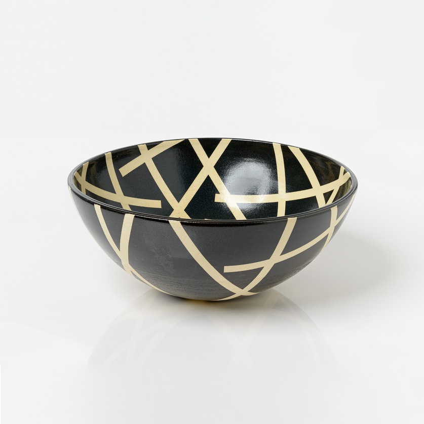 Modern decorative bowl with stripes