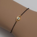 Bracelet “eye” with emerald