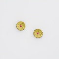 Round stud earrings in silver and gold with rubies