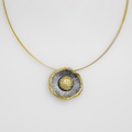 Flower-shaped silver necklace with gold inlay