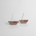Ceramic sailboat with white sail
