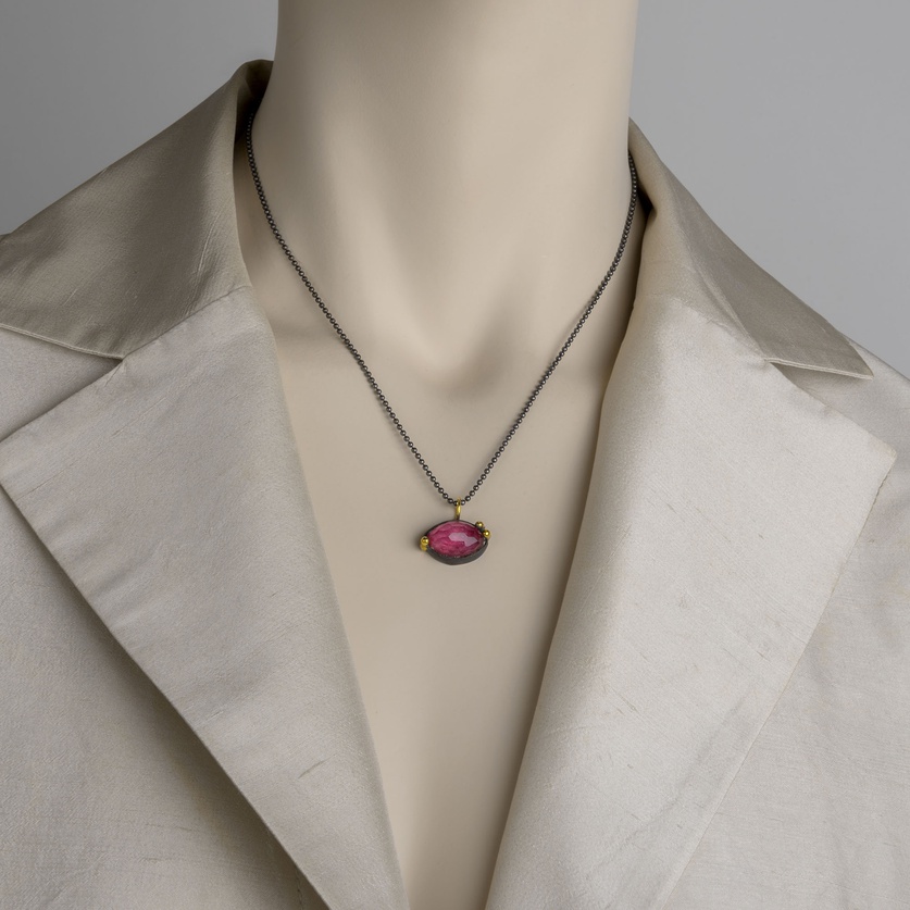 Minimal silver & gold pendant with ruby doublet stone