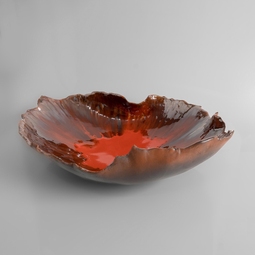 Red ceramic leaf-shaped platter