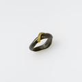Modern silver ring with gold stripe and diamonds
