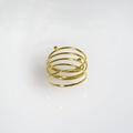 Spiralling ring in K14 gold with three diamonds (medium size)