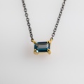 Beautiful necklace in gold with blue topaz