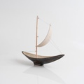 Ceramic sailboat of black colour