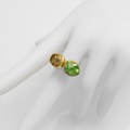 Radiant ring with peridot and yellow quartz