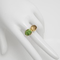 Radiant ring with peridot and yellow quartz
