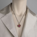 Heart-shaped pendant in silver & gold with ruby doublet