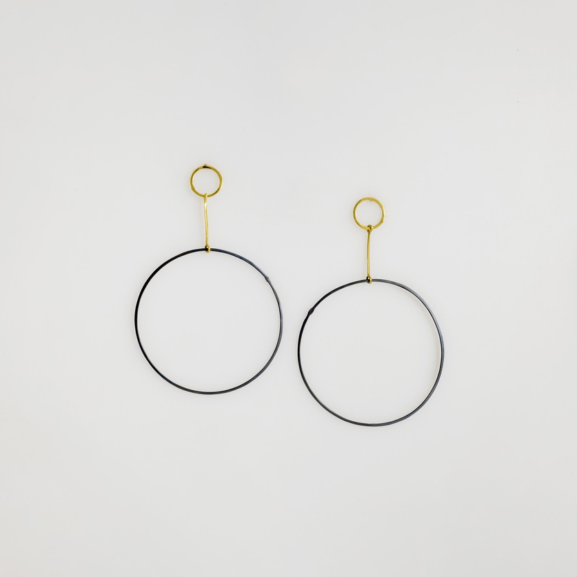 Long sleek double hoops in gold and oxidized silver