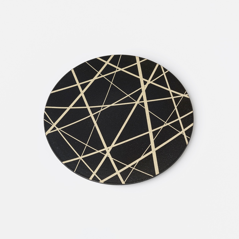 Decorative ceramic platter with asymmetrical lines