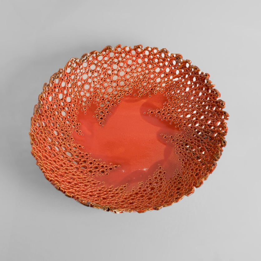 Red perforated ceramic platter