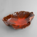 Red ceramic leaf-shaped platter