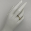 Slim ring in silver and gold with small diamonds