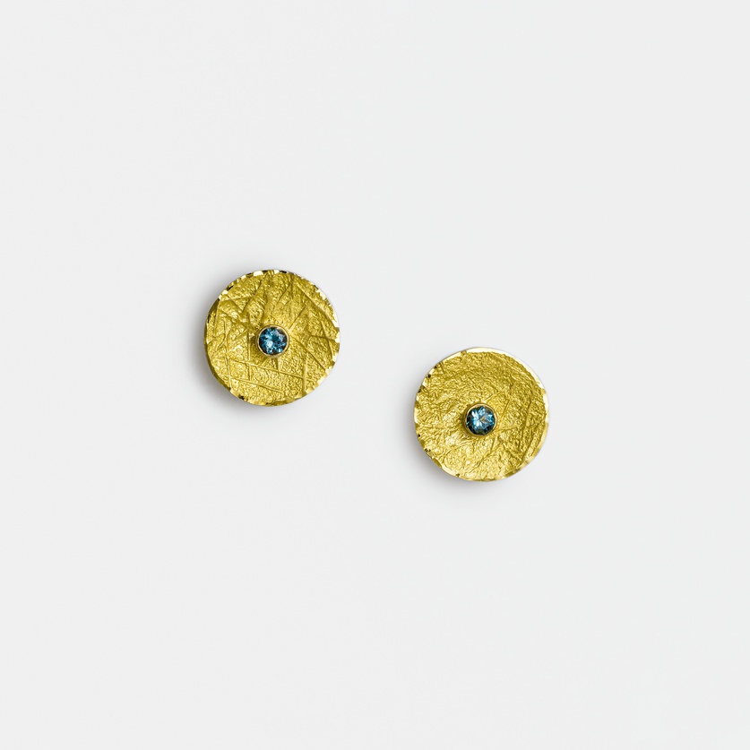 Round stud earrings in silver and gold with aquamarines