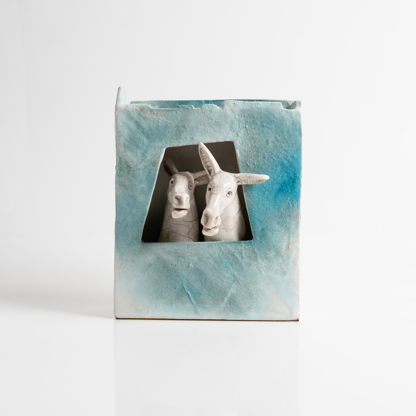 Ceramic composition with donkeys