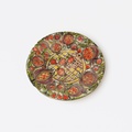 Round engraved ceramic platter with pomegranate design