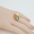 Elegant ring with aquamarine, heliodor and morganite