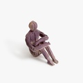 Ceramic seated figurine