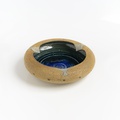 Beautiful ceramic bowl with deep blue glazing color