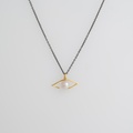 Gold “eye” necklace with pearl