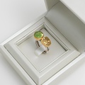 Radiant ring with peridot and yellow quartz